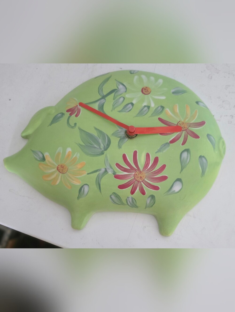 Green Floral Wall Clock with Red Hands